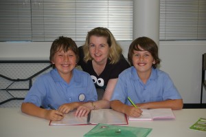 YA presenter Cheryse Durant with two aspiring writers during one of her school visits.